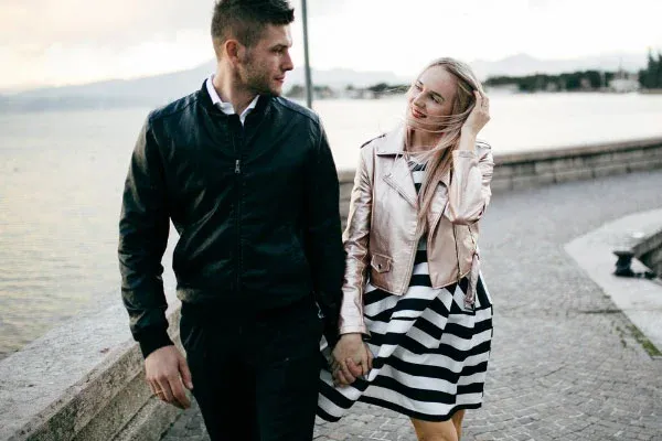 Bellevue couple walking along waterfront park