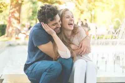 Couple embracing outside