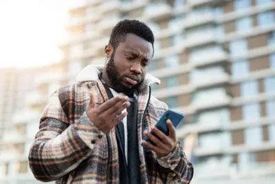 frustrated man texting