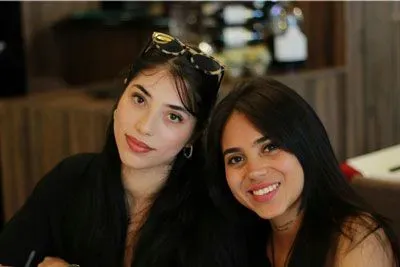 Portuguese women smiling at camera