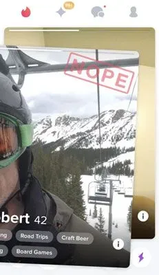 "Nope" displayed on a dating profile as the user swipes left