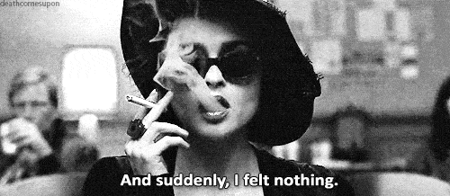 Gif of woman smoking with text "And suddenly I felt nothing"